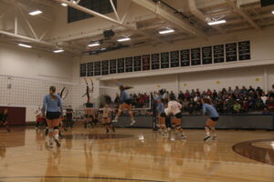 Western's Women's volleyball team playing in the Pavilion. Photo by Meg Jackson.
