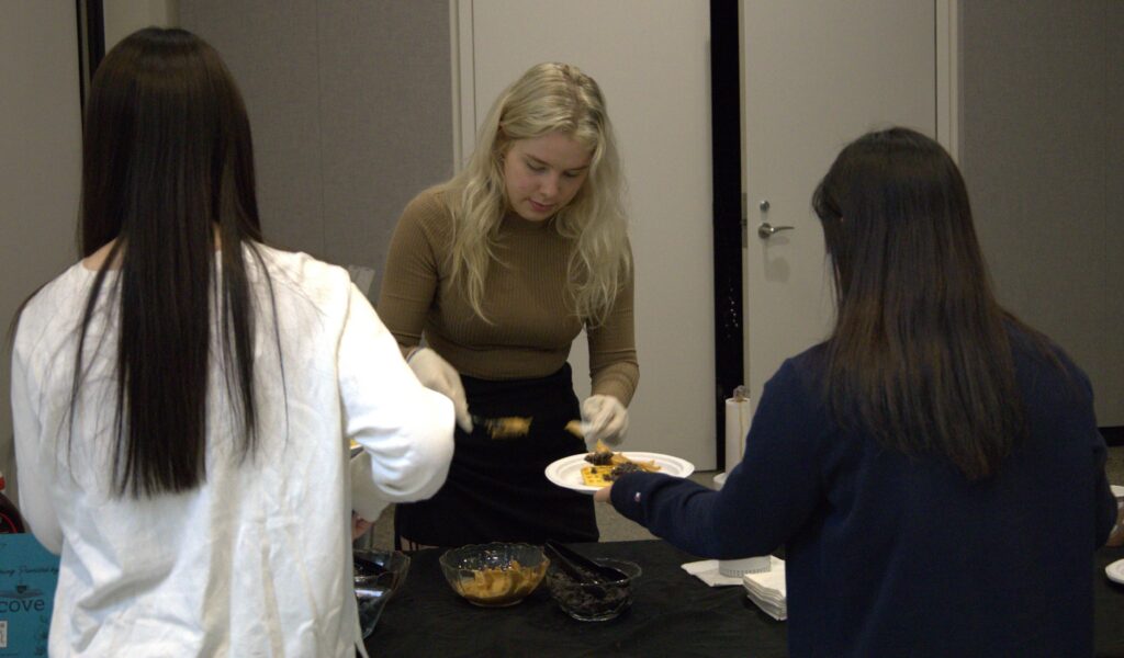 Leseah Kennedy serves up food at a recent Wingles event.